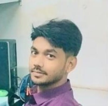 Nitish Raj SEO expert sitting in office workspace offering SEO, Facebook Ads, and Instagram Ads services for business growth and lead generation in India.